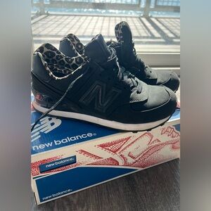 New Balance 574 Black sneakers with leopard lining